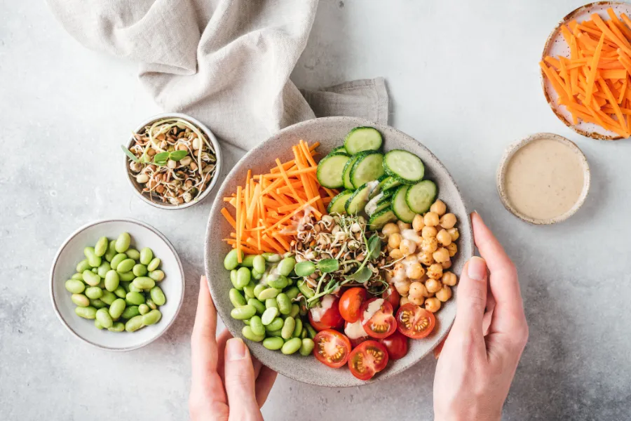 bowl of healthy food including fruits and vegetables